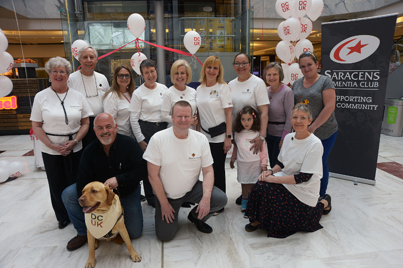 Dementia Club UK volunteers & kneeling Dr Angela Parker our Dementia Club UK doctor
