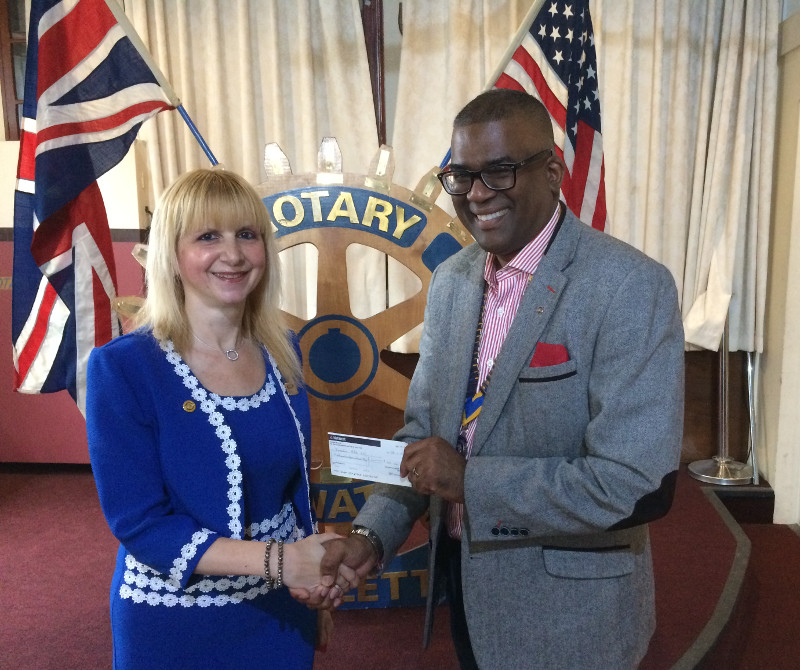 The President of the Rotary Club of Radlett Mr Clive Daley presenting a cheque to Lisa Chairman of Dementia Club UK The President of the Rotary Club of Radlett Mr Clive Daley presenting a cheque to Lisa Chairman of Dementia Club UK