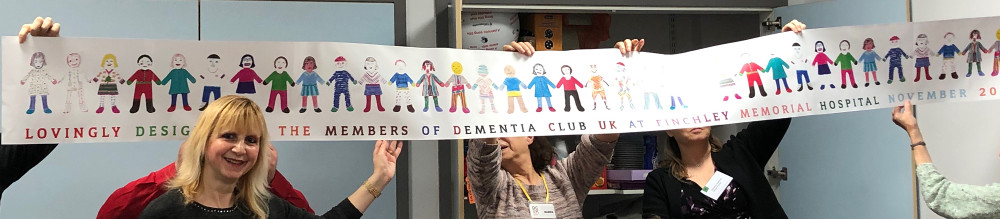 Members thrilled to see completed banner Members thrilled to see completed banner