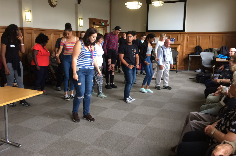 NCS students showing some of the members of Dementia Club UK how to line dance NCS students showing some of the members of Dementia Club UK how to line dance
