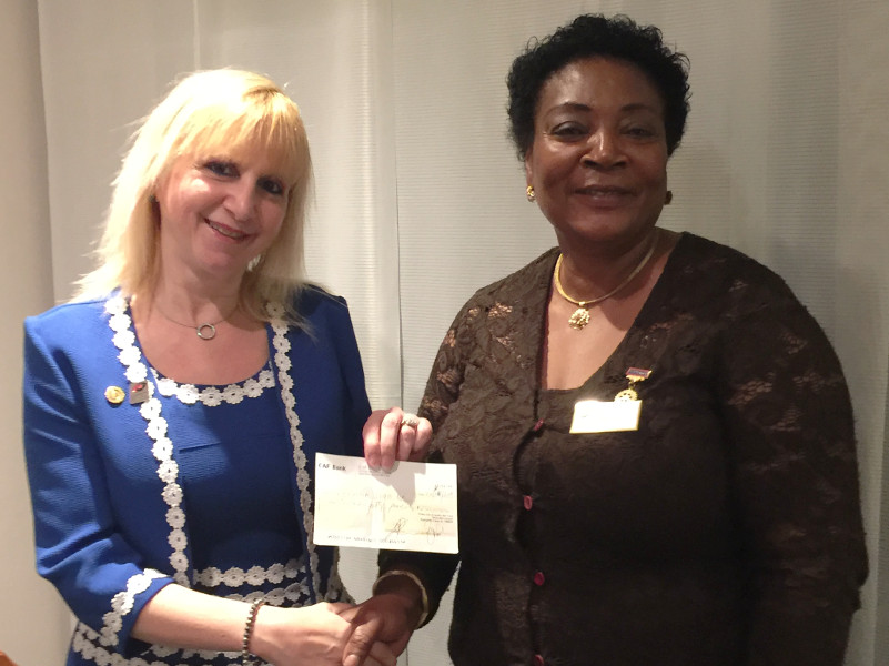 Eugenia Dike President of the Rotary Club of Hendon presenting a cheque to Lisa Eugenia Dike President of the Rotary Club of Hendon presenting a cheque to Lisa