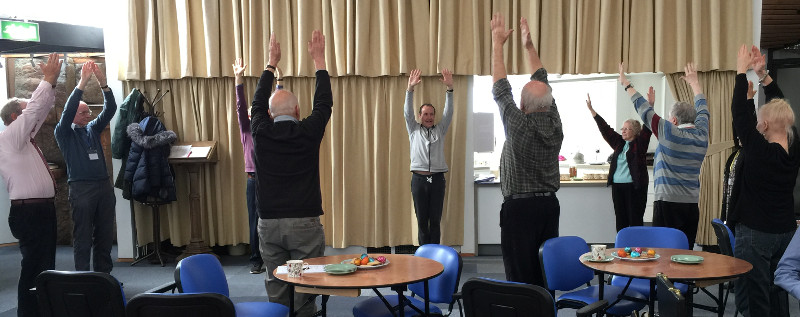 Richard instructing chair yoga Richard instructing chair yoga
