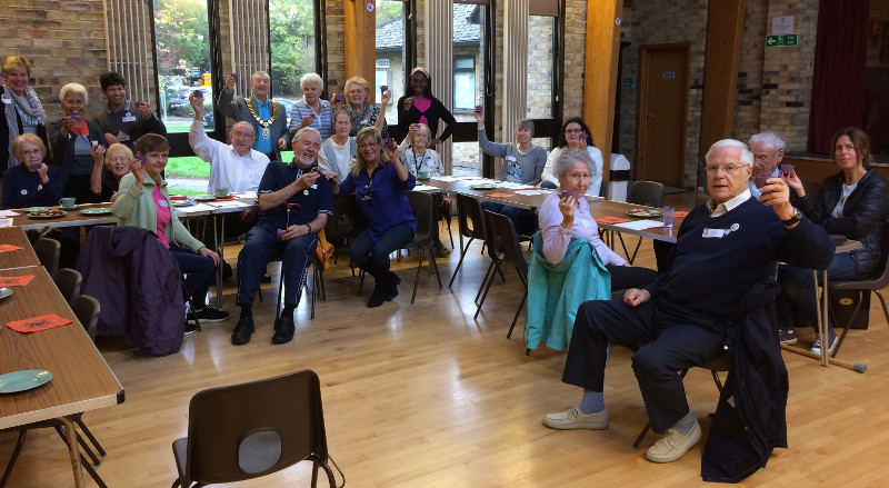 Members holding up purple cup cakes baked by Sasha to celebrate Rotary's fight against Polio Members holding up purple cup cakes baked by Sasha to celebrate Rotary's fight against Polio