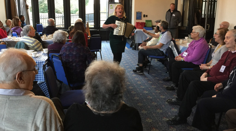 Helen Tierney entertaining the members of Dementia Club UK at Stephens House and Gardens Helen Tierney entertaining the members of Dementia Club UK at Stephens House and Gardens