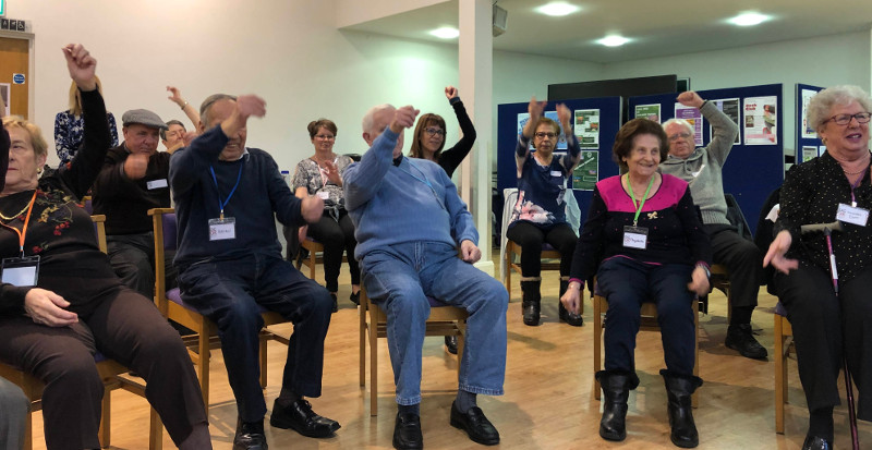 Dementia Club UK members doing chair exercises led by Jane Dementia Club UK members doing chair exercises led by Jane