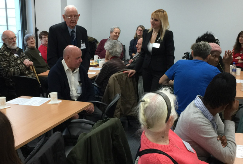 Laurie standing, recounting his Christmas to the members of Dementia Club UK Laurie standing, recounting his Christmas to the members of Dementia Club UK