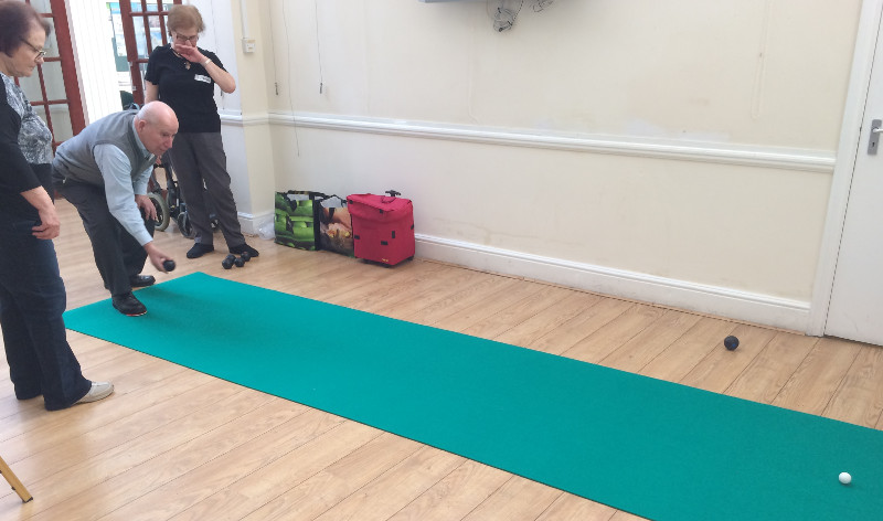 Carpet bowls at Dementia Club UK Carpet bowls at Dementia Club UK