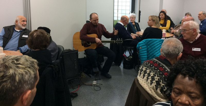Members enjoyed listening to music favourites played by Egon the guitarist Members enjoyed listening to music favourites played by Egon the guitarist